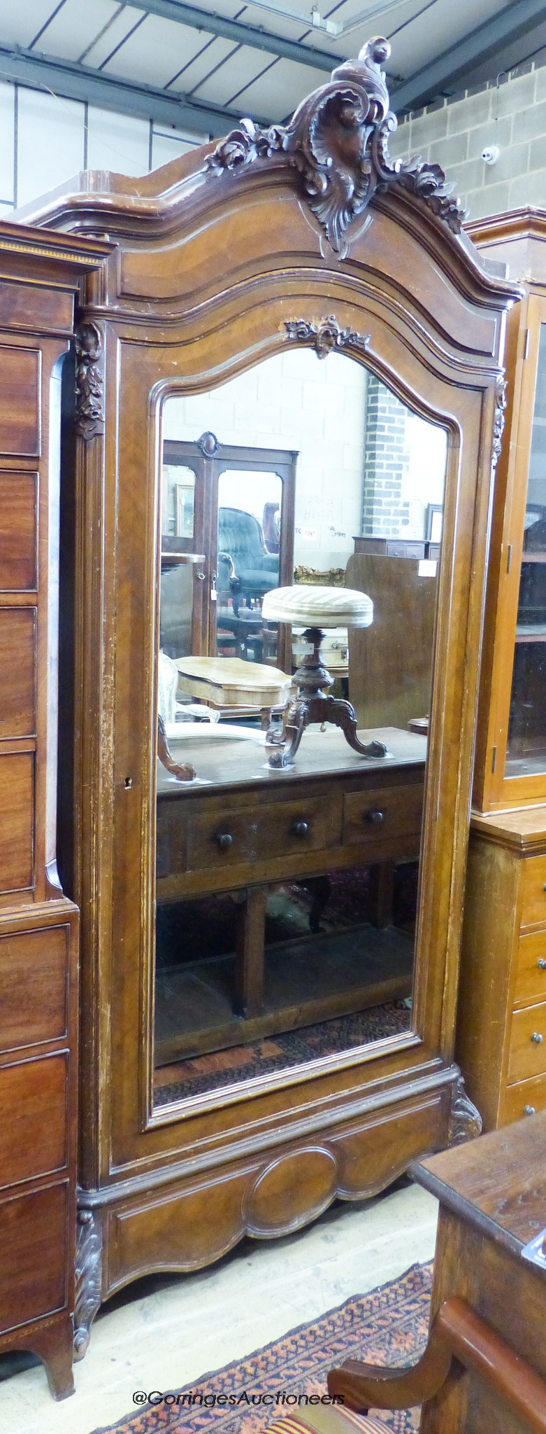 A late 19th century French mirrored armoire. W-106, D-46, H-242cm.